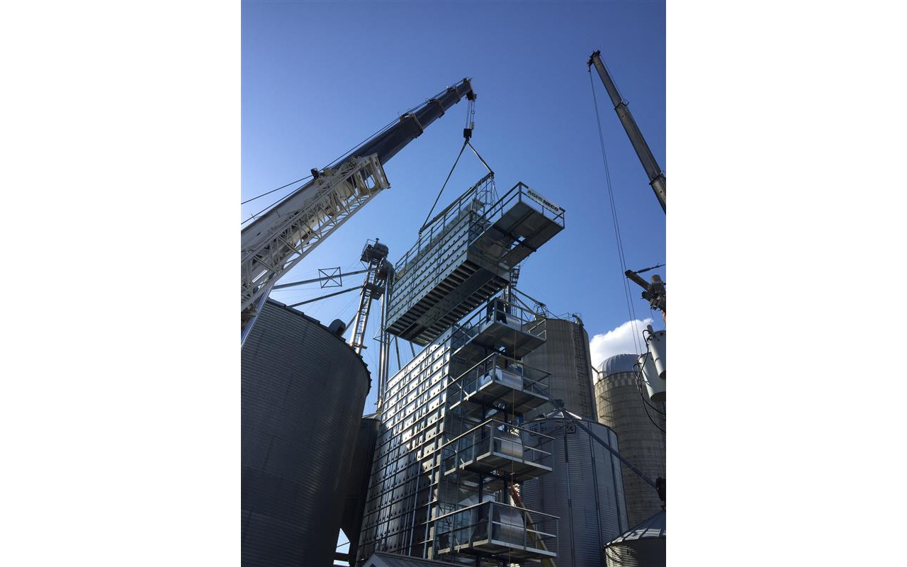 Picture of Xcaliber Crane & Rigging hoisting a section of Neco grain dryer
